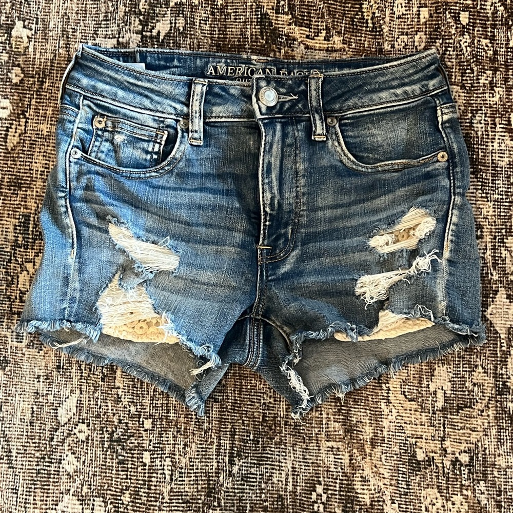 AMERICAN EAGLE DISTRESSED DENIM SHORTS